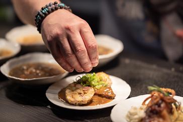 Restaurace Talíř | Prague | Photogallery | Beef goulash with bacon dumpling and chili hair and spring onion