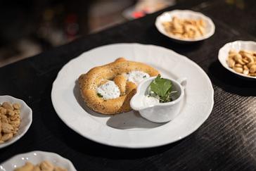 Restaurace Talíř | Prague | Photogallery | Baked pretzel with herb curd